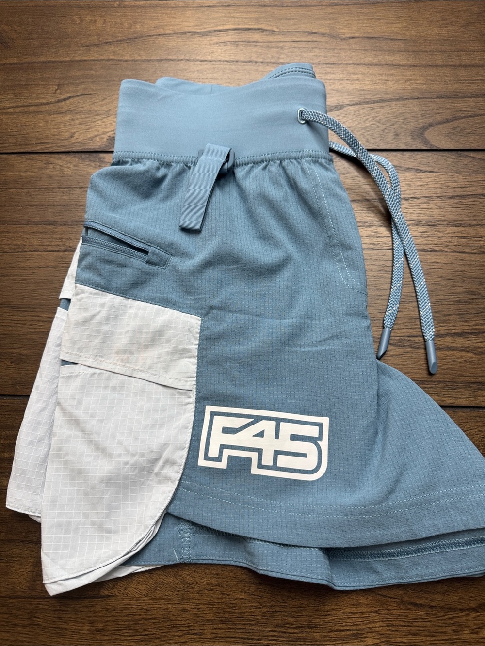 lululemon athletica light blue performance shorts with contrast pocket
